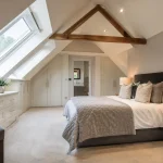 A luxurious, beautifully finished bedroom highlighting how much does a loft conversion cost on average.