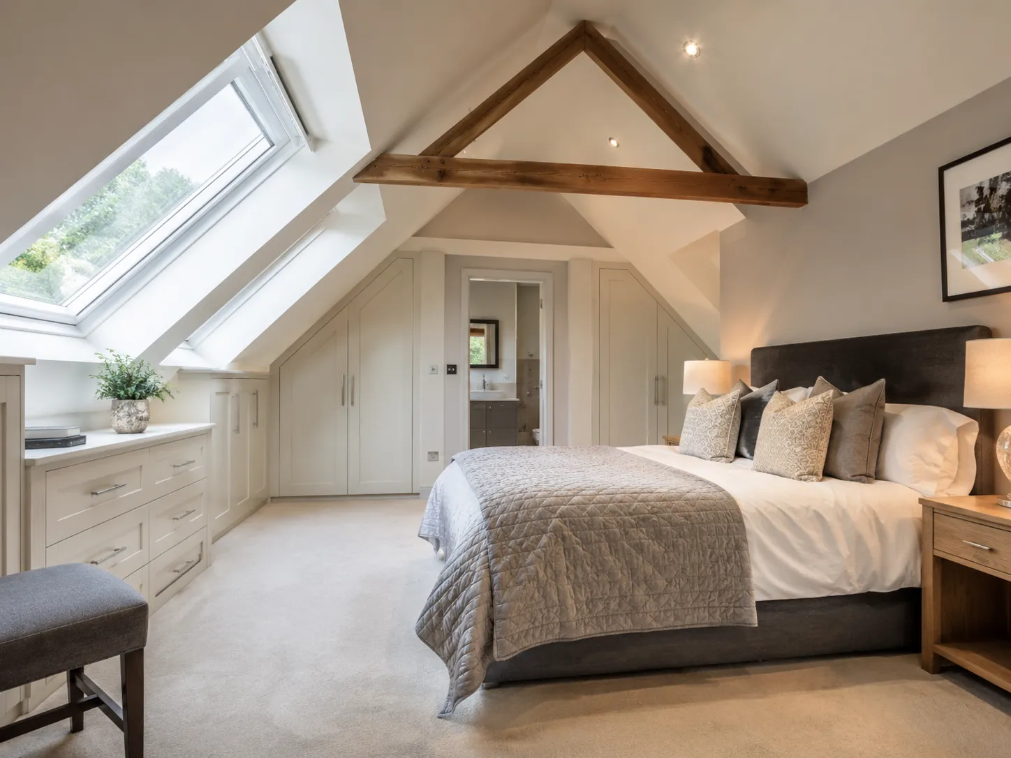 A luxurious, beautifully finished bedroom highlighting how much does a loft conversion cost on average.